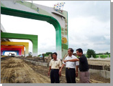 Chief of township inspecting the engineering project on the image of the entrance